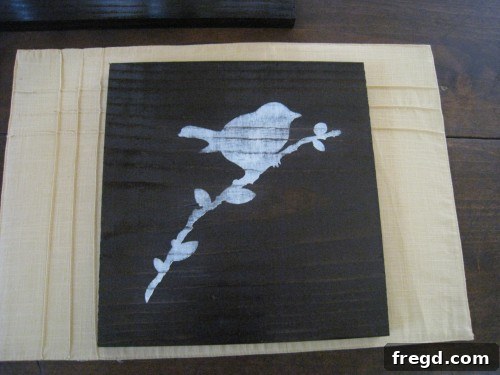 Elegant stenciled chargers positioned on a dining table, highlighting their role in enhancing home decor