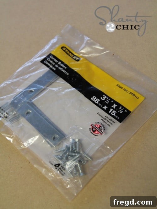 Metal decorative corner brackets for the mirror