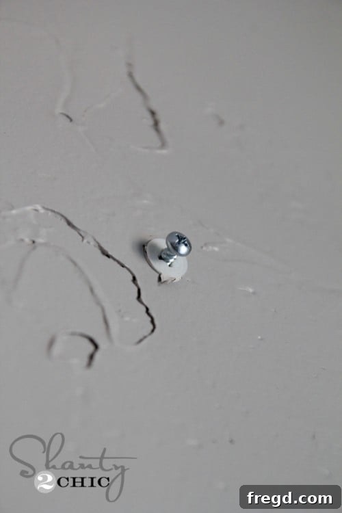 How to attach a drywall anchor for secure hanging