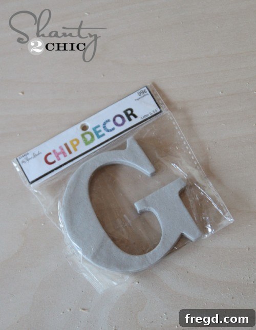 Personalized DIY wood block frame with a distressed chipboard letter