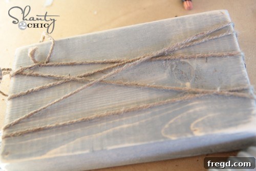 Wrapping jute twine evenly around the DIY wood block frame