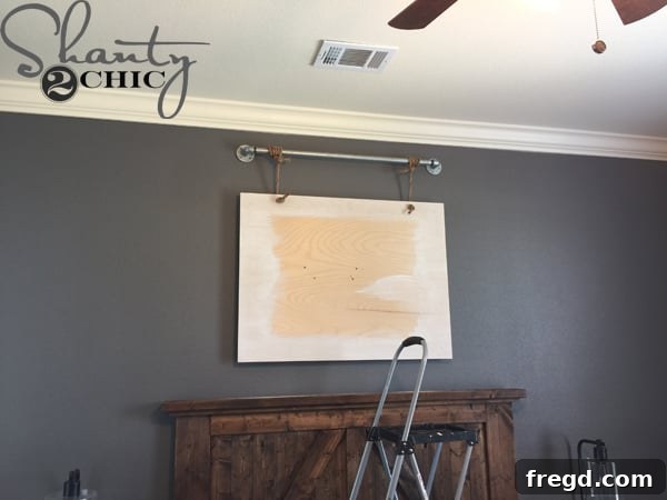 rope-hanging-from-plywood