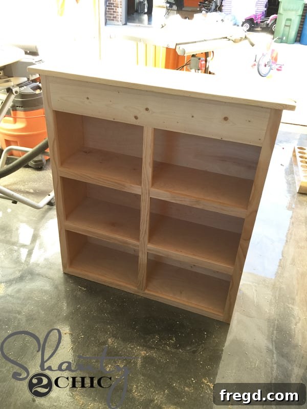 Cabinet with back panel attached, ready for trim