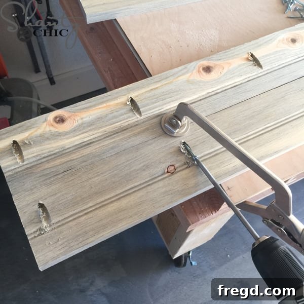 Attaching planks for the sliding barn door with pocket holes