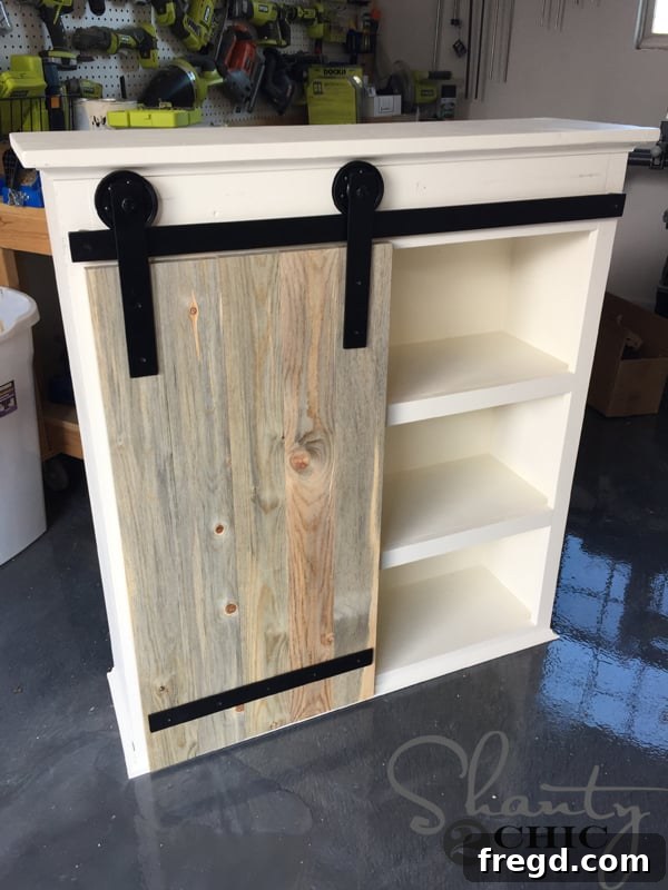 Installing custom barn door hardware with black construction screws
