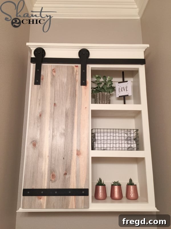 DIY Sliding Barn Door Bathroom Cabinet showcasing open storage