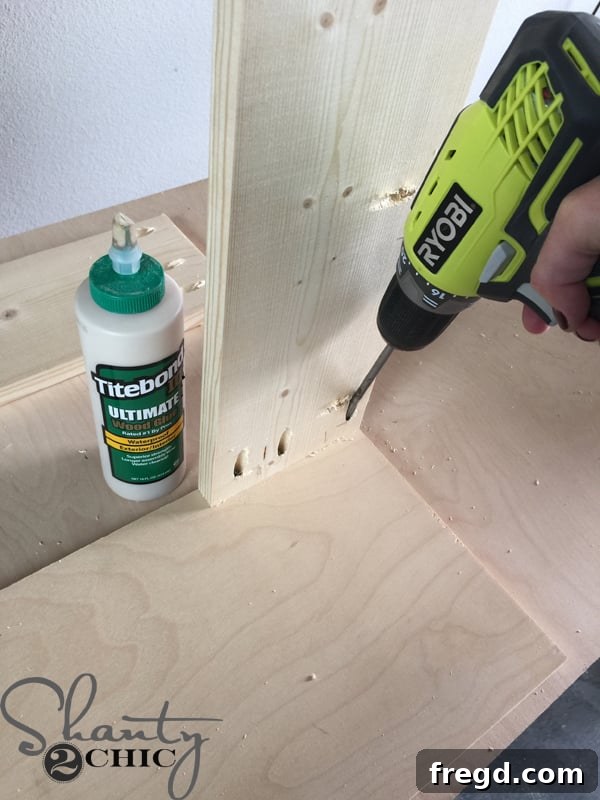 Attaching top brace pieces to the cabinet sides