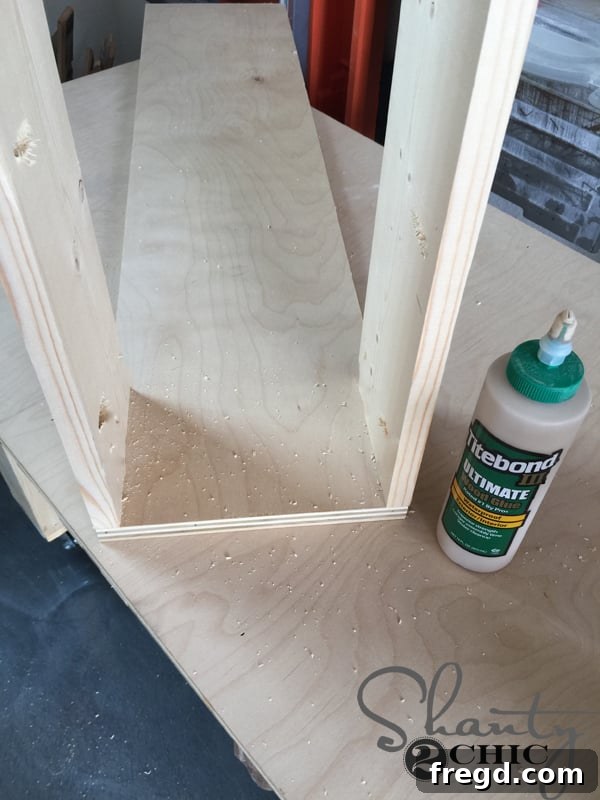 Top pieces attached flush with cabinet sides