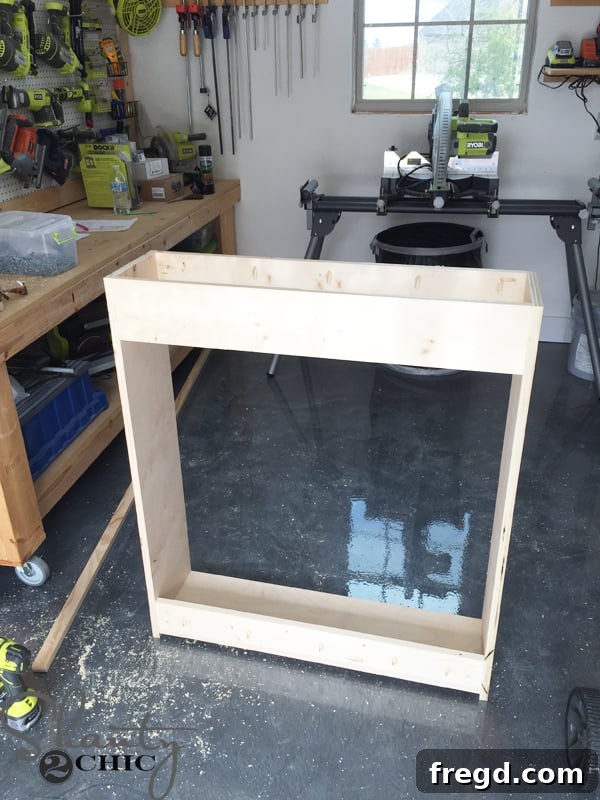 Cabinet box with bottom shelf and brace attached