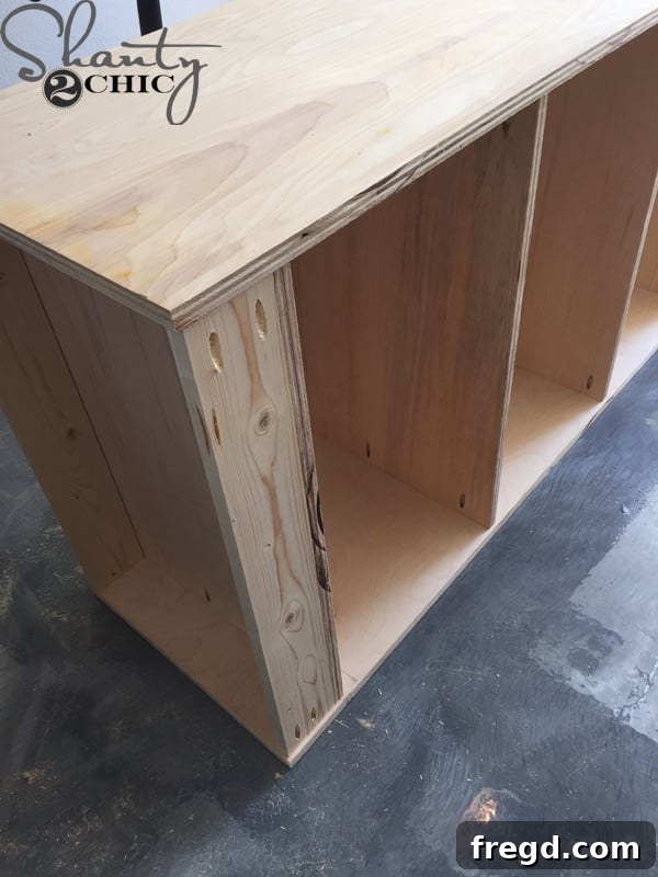 Optimizing My Sliding Barn Door Media Console with Custom Shelving 12 Top View of the Bookshelf with Bottom Supports Attached