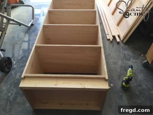 Optimizing My Sliding Barn Door Media Console with Custom Shelving 16 Attaching the Bottom Toe Kick Cover to the Cabinet