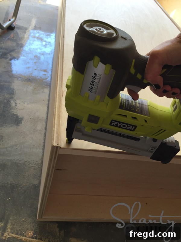 Optimizing My Sliding Barn Door Media Console with Custom Shelving 22 Attaching the Back Panel to the Bookshelf