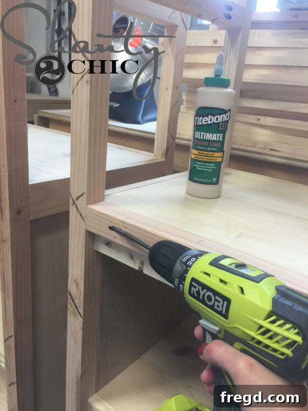 Attaching the brace piece to the back of the cabinet