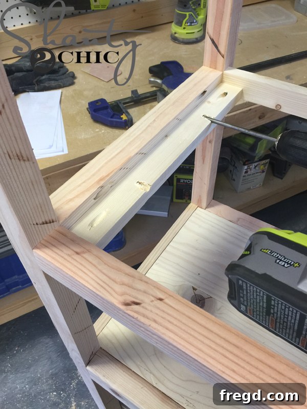 Attaching shelf cleats to the office tower