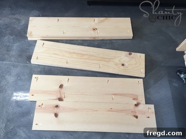 Drilling pocket holes in shelf pieces with Kreg K5