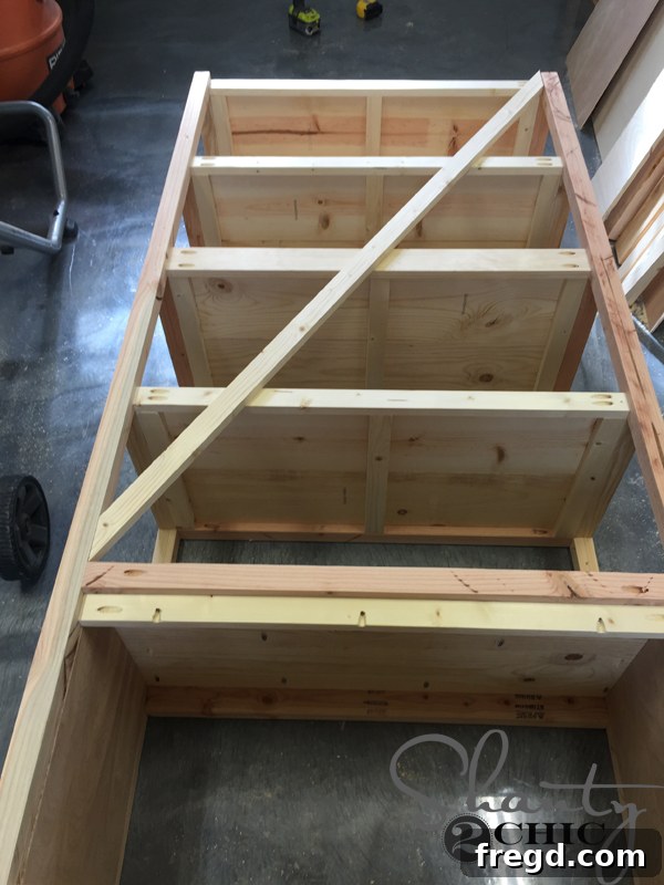 Dry-fitting 'X' pieces on the back of the office tower