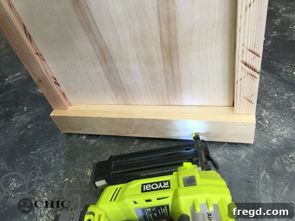 Attaching bottom trim with brad nailer
