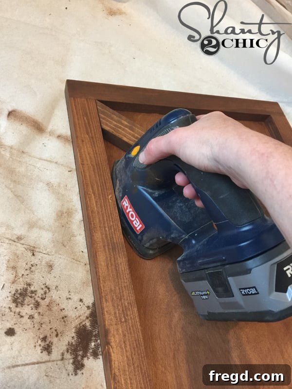 Using a corner cat sander for distressing hard-to-reach areas