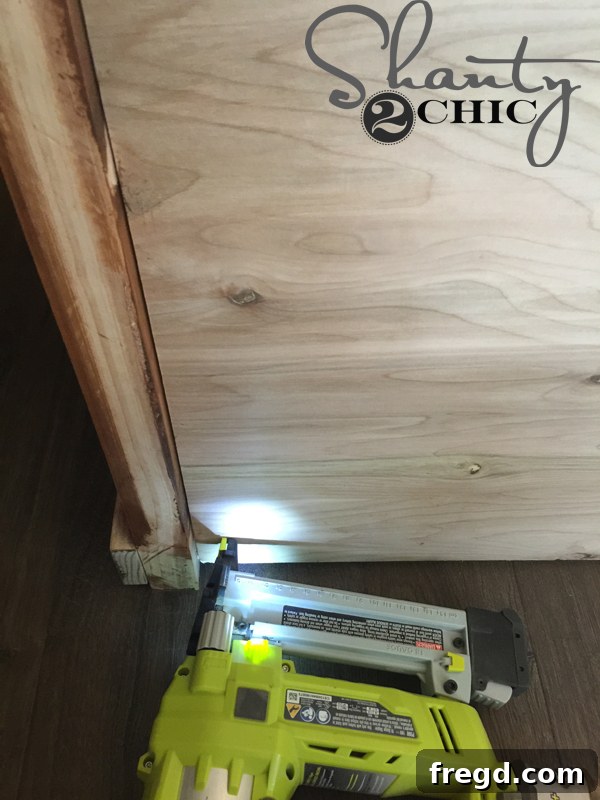 Attaching back panel of the cabinet