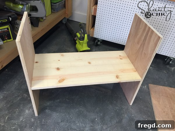 Cabinet base with two plywood sides and one shelf