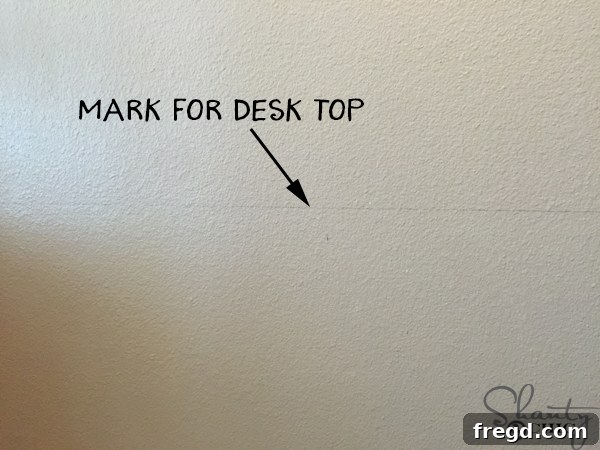 Drawing a level line for the top of the floating desk