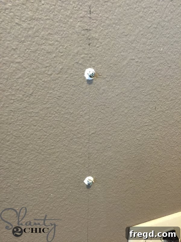 Installing wall anchors for floating desk corbels