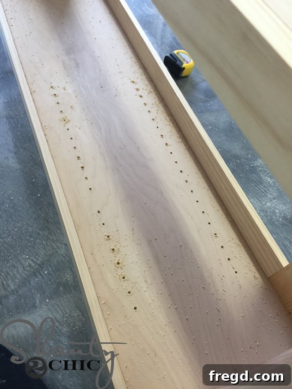 Locker interior with shelf pin holes drilled