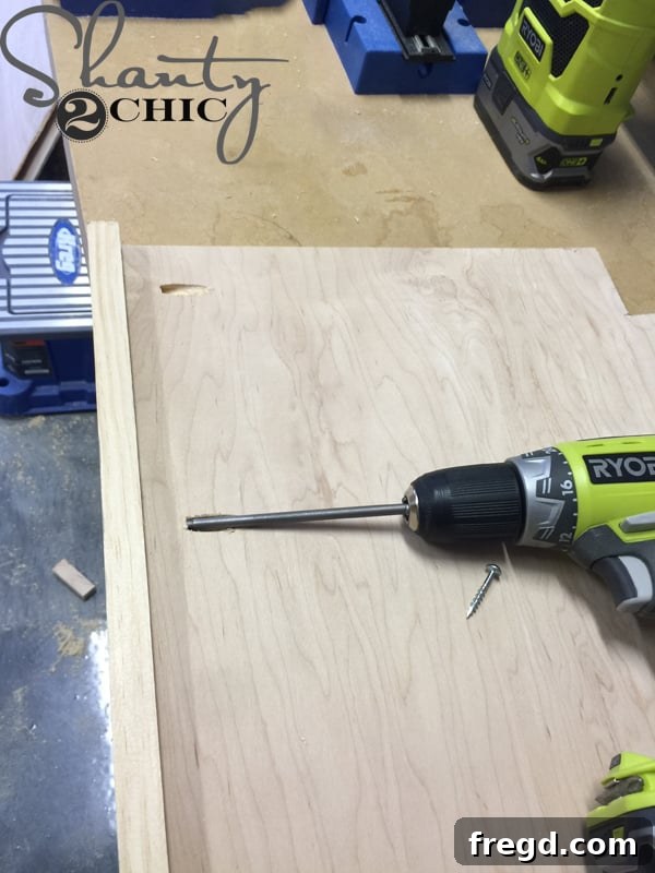 Attaching trim to the front of a shelf with pocket holes