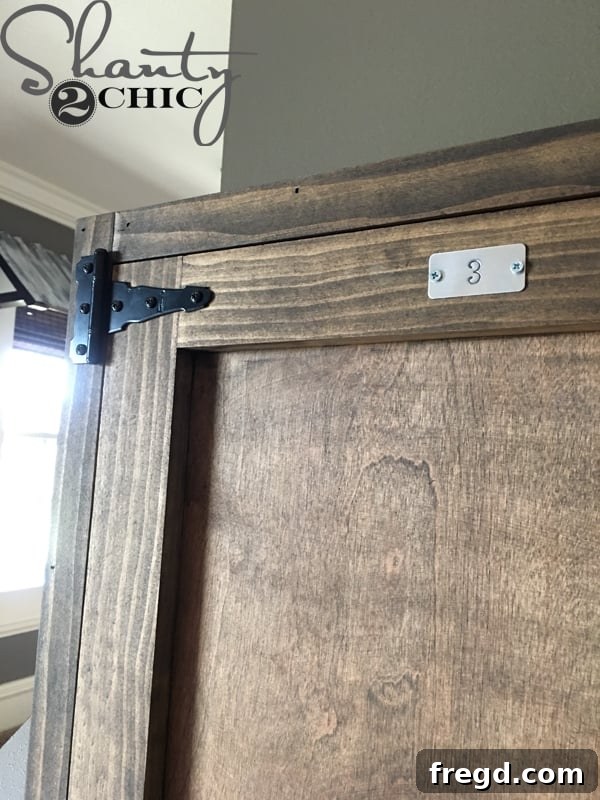 Close-up of vintage metal locker plate
