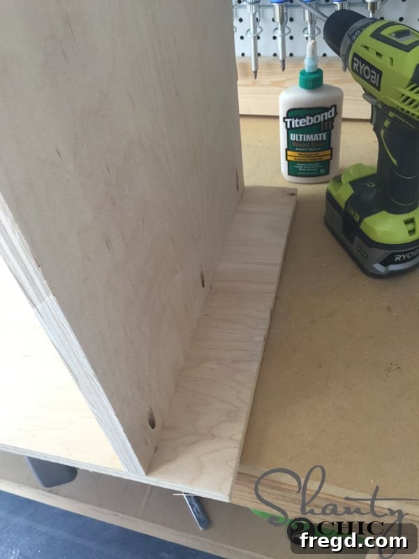 Attaching locker side pieces to bottom