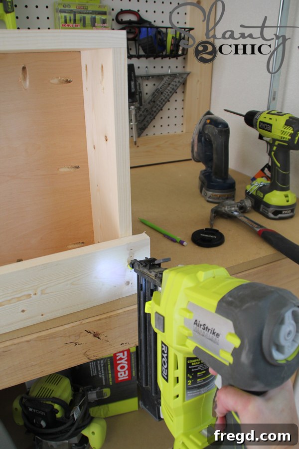 Attaching the 1x4 section of the desk top flush with the back edge
