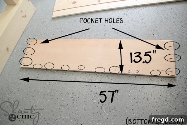 Plywood bottom of the floating desk with pocket holes drilled