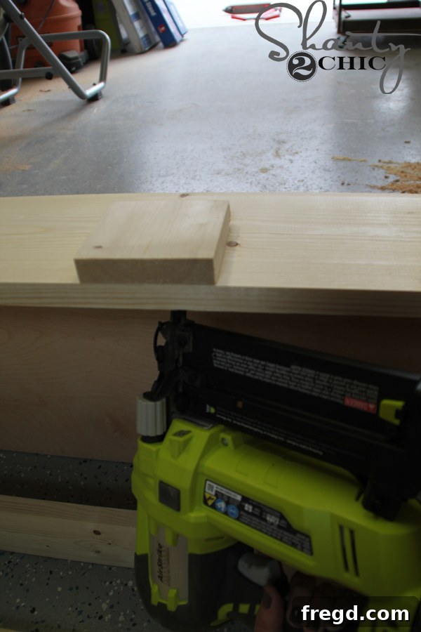 Internal view of the desk showing the spacer block for the lock mechanism