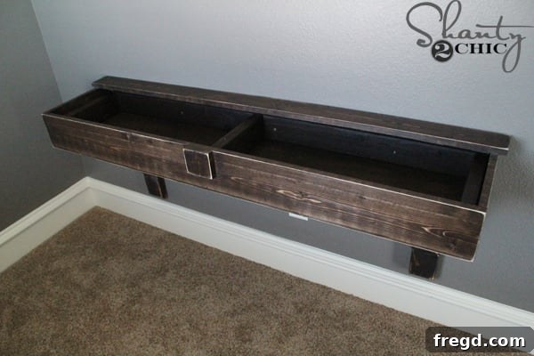 Sliding the desk body over the installed wall cleat