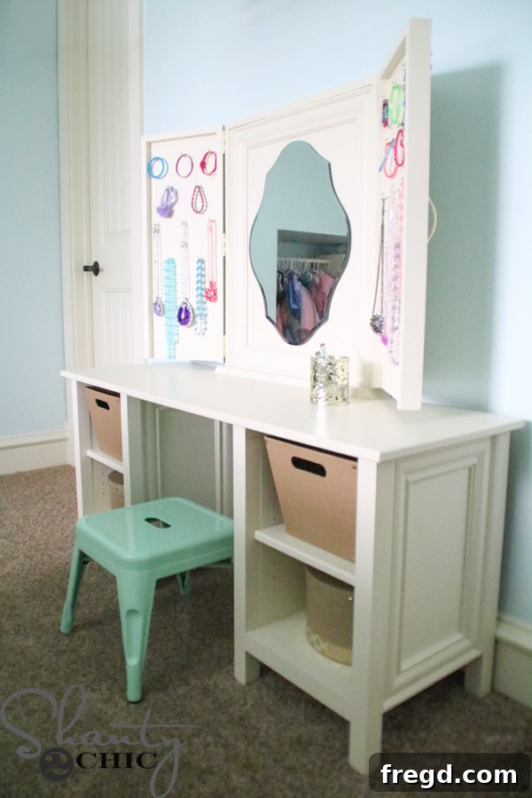 Completed DIY wooden vanity with mirror and jewelry storage