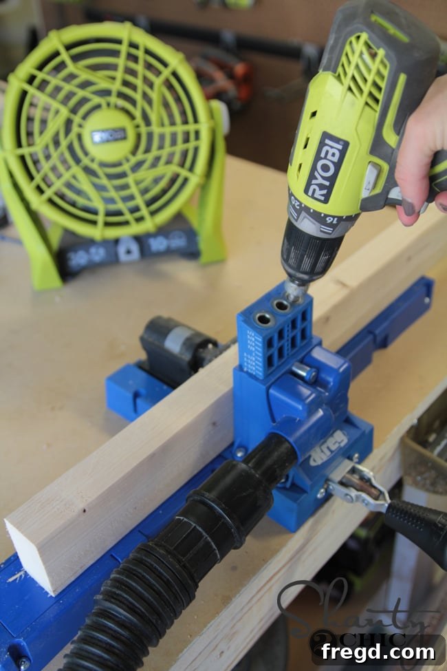DIY Modern Open Concept Farmhouse Table HGTV Style 9 Kreg Jig K5 for drilling pocket holes on cross supports