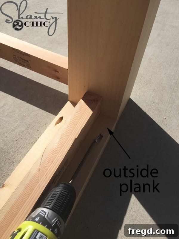 DIY Modern Open Concept Farmhouse Table HGTV Style 13 Attaching the outside tabletop planks, ensuring flush alignment
