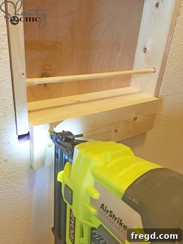 attach-bottom-trim-piece-to-spice-rack