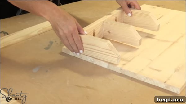 Adding the middle mail divider to the sorter with glue and brad nails