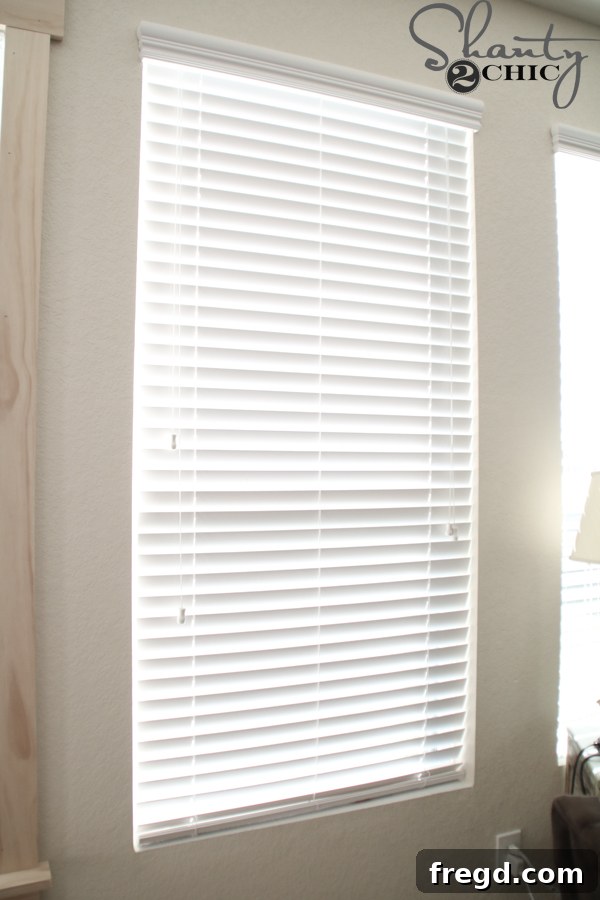 Before and after comparison of builder-grade window to new trim