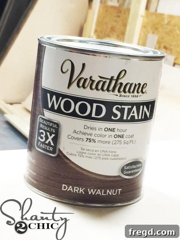 Craft a Plate Rack for Only $95 21 Applying Dark Walnut stain to the plate rack shelves