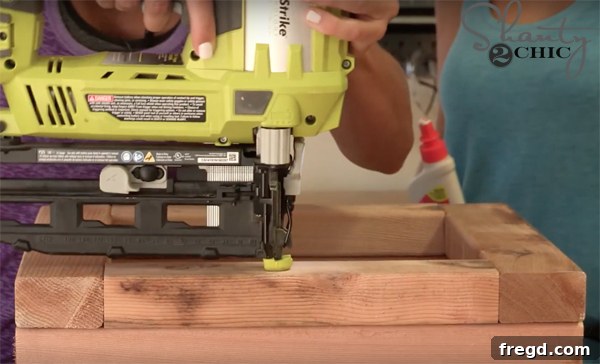 Build a Beautiful Cedar Planter for Under $25: A Complete DIY Guide 8 Attaching First Layer of Planter with Finish Nails