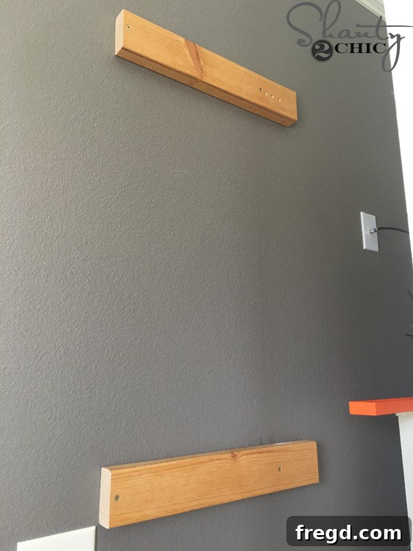 Rustic Glide Media Hub 18 wall-cleats-installed-behind-bookcases