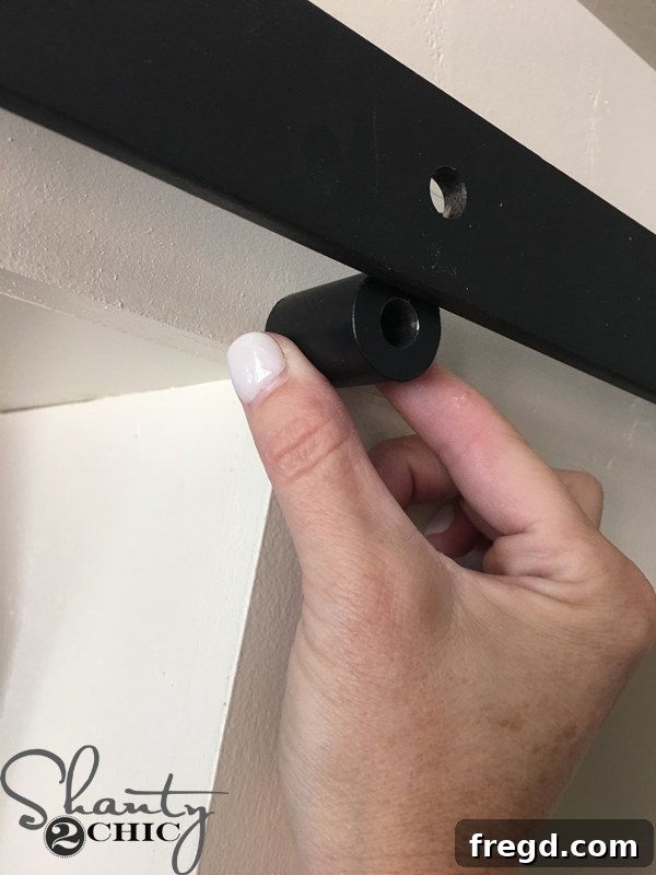 Rustic Glide Media Hub 45 installing-barn-door-track-bolts-with-spacer