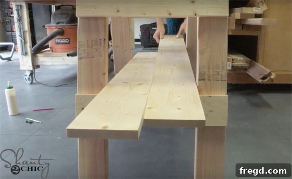 Weekend Build: Sawhorse Bookcase with Video Instructions 12 Sliding shelf pieces onto the ladder rungs