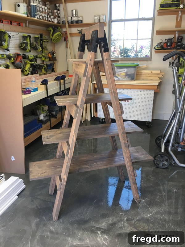 Weekend Build: Sawhorse Bookcase with Video Instructions 15 Finished ladder shelf with Briarsmoke stain