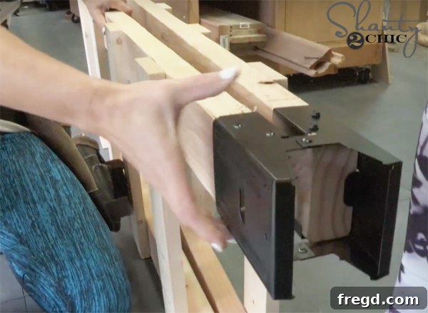 Weekend Build: Sawhorse Bookcase with Video Instructions 8 Fitting sawhorse brackets over the top ends of ladder rails