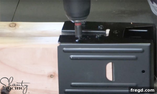 Weekend Build: Sawhorse Bookcase with Video Instructions 9 Attaching sawhorse brackets with 18V drill and hex screws