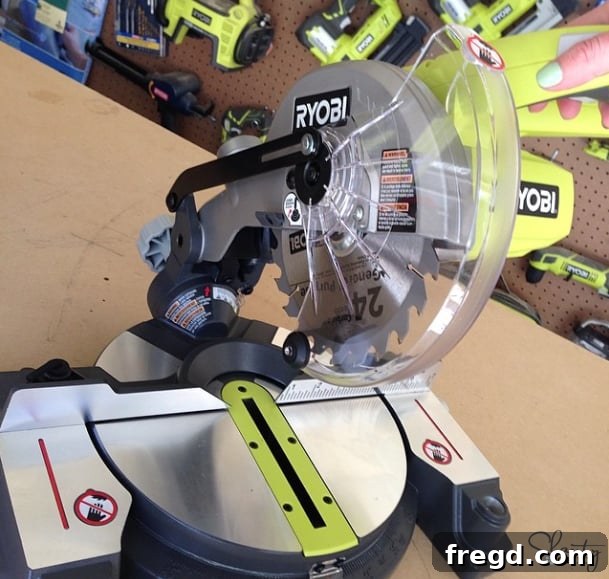 Collection of three 18-Volt power tools: a miter saw, brad nailer, and drill