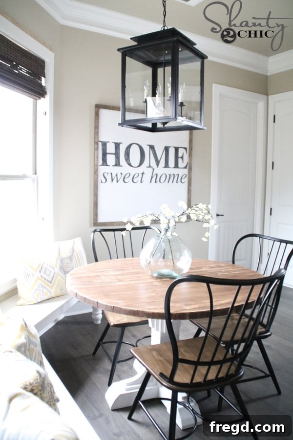 Finished large hand-painted 'Home Sweet Home' sign displayed in a living room.